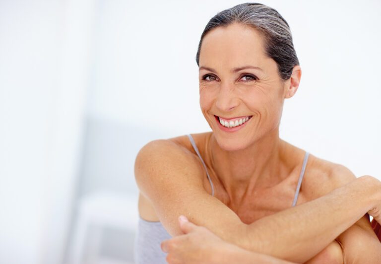 Cropped portrait of a beautiful mature woman .