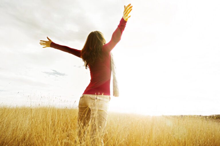 woman raising hands